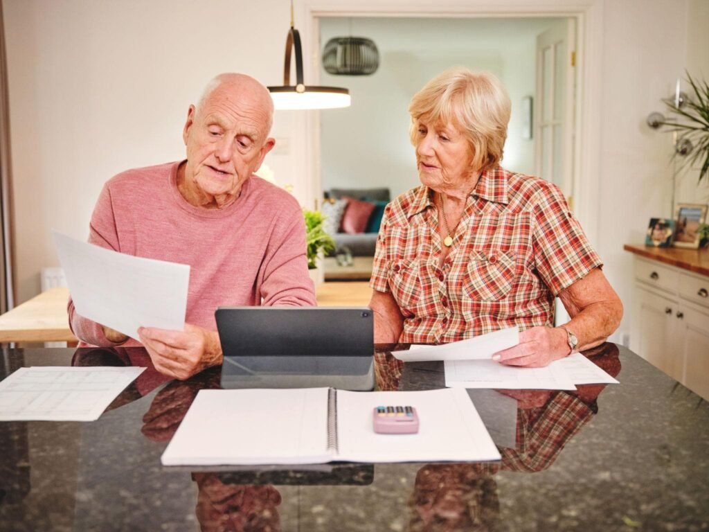 British expat couple reviewing healthcare options in Spain including private health insurance and the Convenio Especial